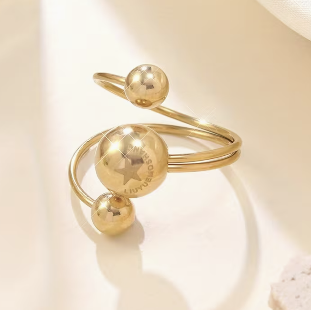 Anillo dorado Tres esferas -