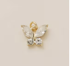 [MAM-CHA-006-PI1] Charm Mariposa Blanca